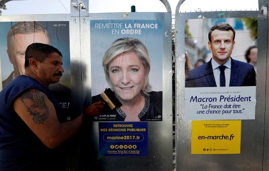 Macron y Le Pen lideran encuestas de elecciones en Francia