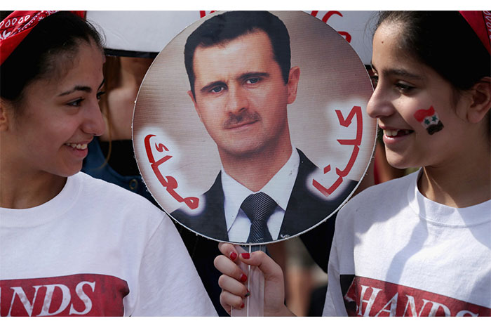 Sirios apoyan a al-Assad en comicios presidenciales	
