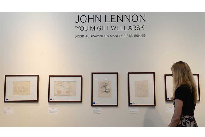 Manuscritos y dibujos de John Lennon dinamitan las expectativas en una subasta