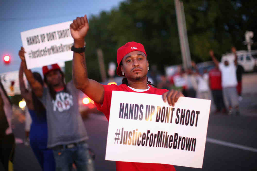 Protesta en Washington por asesinato de joven negro en Ferguson	